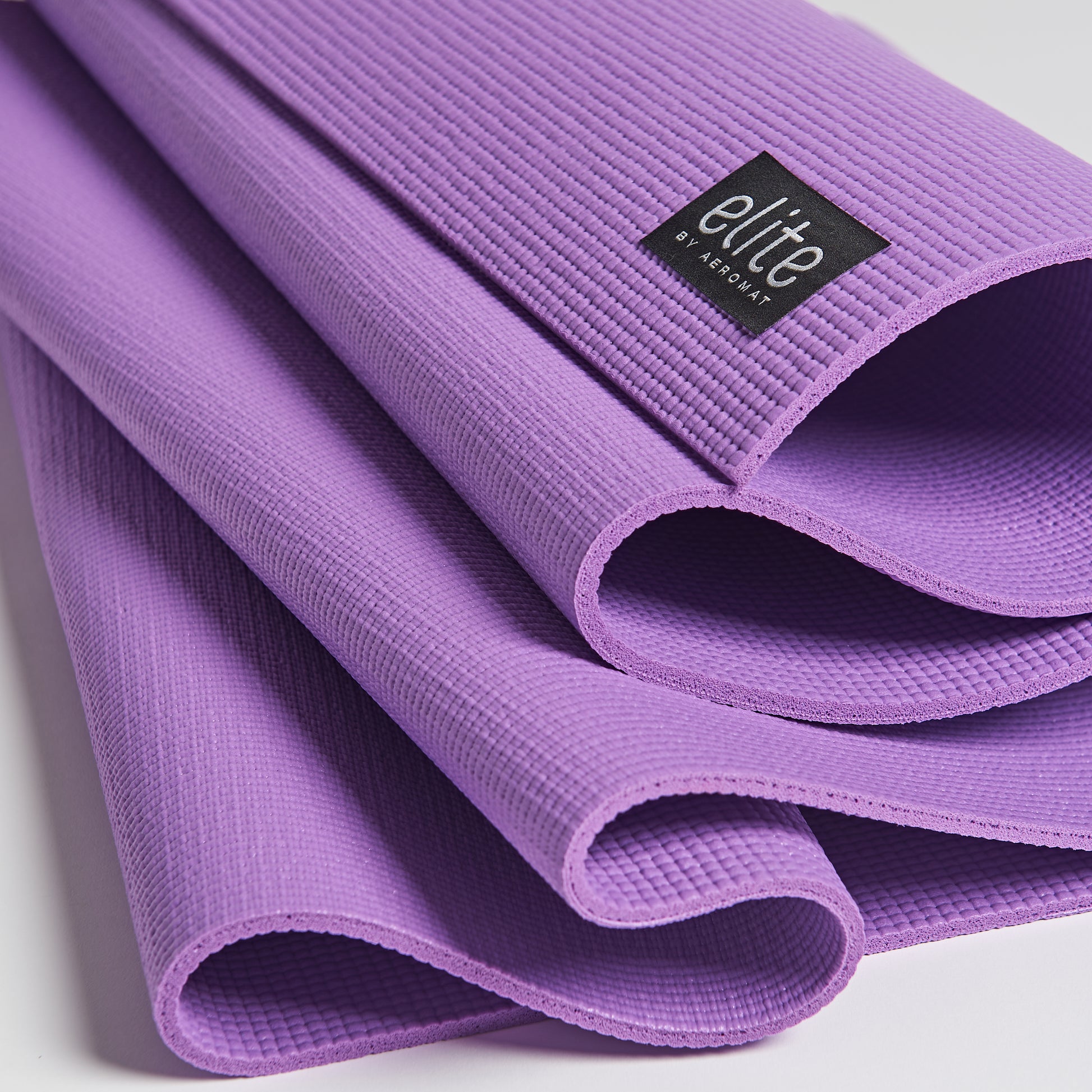 https://www.aeromats.com/cdn/shop/products/72302-AEROMATEliteYogaMat-PastelPurple-2.jpg?v=1675901531&width=1946